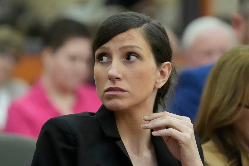 Kouri Richins, a Utah mother of three who wrote a children's book about coping with grief after her husband's death and was later accused of fatally poisoning him, looks on during a hearing Monday, Aug. 26, 2024, in Park City, Utah. (AP Photo/Rick Bowmer, Pool)