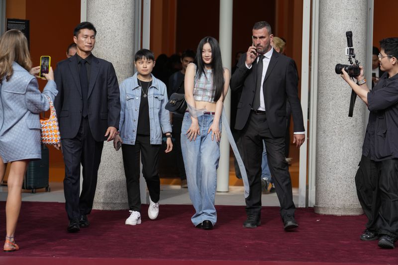 Hanni departs the Gucci Spring Summer 2025 collection, that was presented in Milan, Italy, Friday, Sept. 20, 2024. (AP Photo/Luca Bruno).