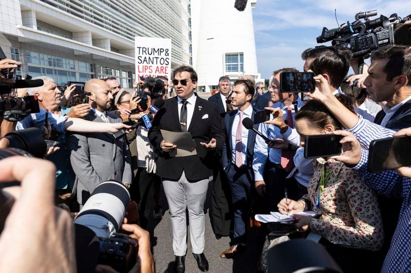 Former U.S. Rep George Santos speaks to the media outside the federal courthouse in Central Islip, N.Y. on, Monday, Aug. 19, 2024 in New York. (AP Photo/Stefan Jeremiah)