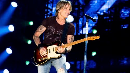 FILE - Keith Urban performs during CMA Fest on Saturday, June 8, 2024, in Nashville, Tenn. (Photo by Amy Harris/Invision/AP, File)