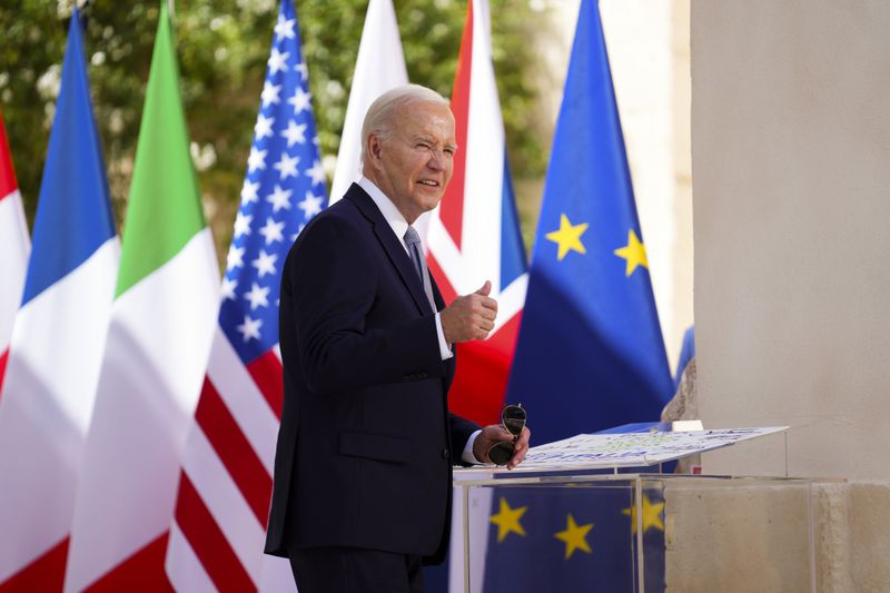 U.S. President Joe Biden arrives to the G7 Summit in Borgo Egnazia, southern Italy, Thursday, June 13, 2024. (Sean Kilpatrick/The Canadian Press via AP)