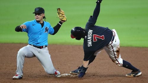 Braves shortstop Dansby Swanson is out stealing second by Miami Marlins second baseman Isan Diaz during the fifth inning in an exhibition game Tuesday, July 21, 2020, at Truit Park in Atlanta.