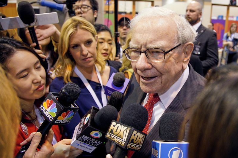 FILE - Warren Buffett, Chairman and CEO of Berkshire Hathaway, speaks to reporters before presiding over the annual shareholders meeting in Omaha, Neb., May 4, 2019. (AP Photo/Nati Harnik, File)