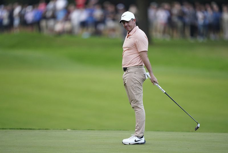 Northern Ireland's Rory McIlroy reacts after missing his birdie putt on the 18th during day two of the 2024 BMW PGA Championship at Wentworth Golf Club in Virginia Water, England, Friday Sept. 20, 2024. (Zac Goodwin/PA via AP)