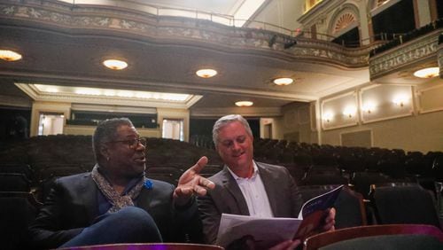 Savannah Music Festival Executive Director Gene Dobbs Bradford and Savannah Music Festival Artistic Director Ryan McMaken look through the lineup for the upcoming Savannah Music Festival;.