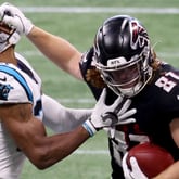 Oct. 11, 2020 - Atlanta: Atlanta Falcons tight end Hayden Hurst (81) stiff-arms Carolina Panthers safety Jeremy Chinn (21) after a catch in the second half Saturday, Oct. 11, 2020, at Mercedes-Benz Stadium in Atlanta. (Jason Getz/For the AJC)