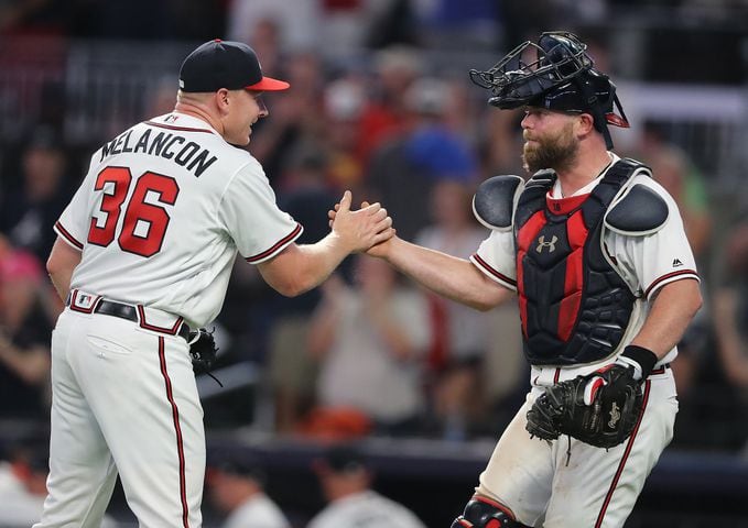 Photos: Braves win opener of key home series with Mets