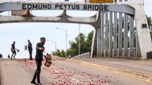 John Lewis final march across Edmund Pettus Bridge