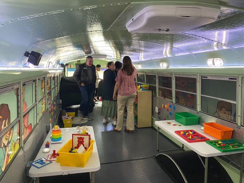 A school bus outfitted with toys, games and other educational resources will travel throughout Gwinnett County to bring learning experiences to families. (Josh Reyes / josh.reyes@ajc.com)