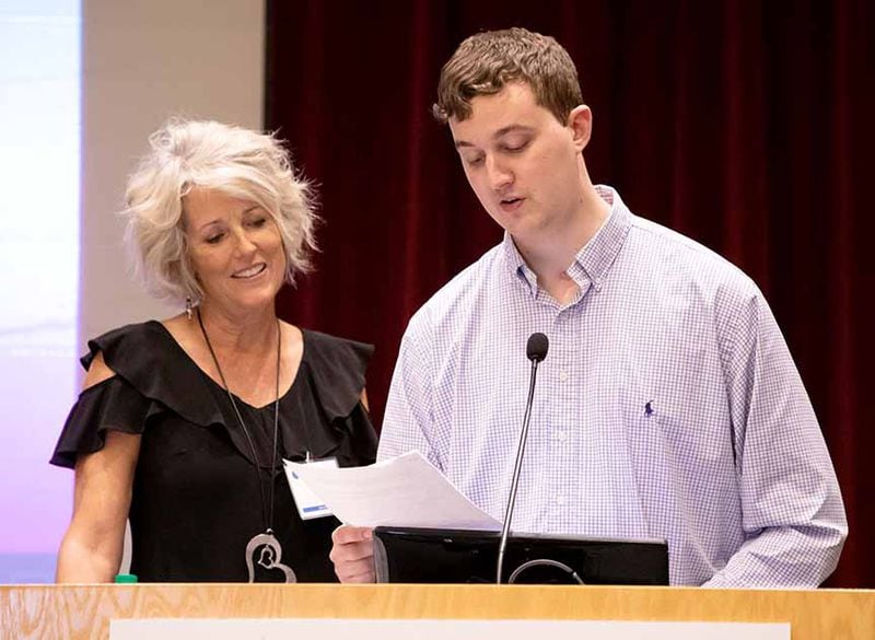 Clark Jacobs, right, and his mother, Mariellen, shared his story with Shepherd Center board members earlier this year.