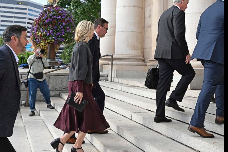 James Murdoch, center, arrives at the Second Judicial District Court in Reno, Nev. on Monday Sept. 16, 2024. (AP Photo/Andy Barron)