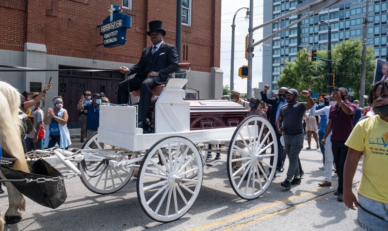 200722-Atlanta-Darrell Watkins drives the caisson carrying C.T. Vivian past the historic Ebenezer Baptist Church during a memorial procession Wednesday afternoon July 22, 2020. Ben Gray for the Atlanta Journal-Constitution