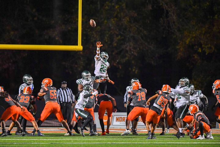 Collins Hill’s Kantrell Webb (23) is unable to block a field goal by North Cobb kicker Mustafa Hohamad (89) during the second half of play Friday, Nov. 10, 2023 at North Cobb High School. (Daniel Varnado/For the AJC)