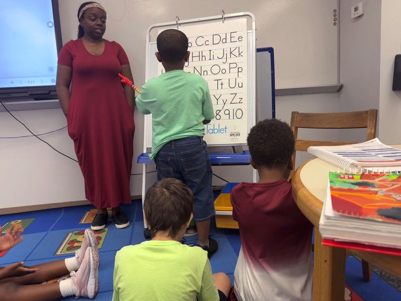 Alexis Kornegay coaches her first grade students on the alphabet at Greenville Elementary School in Greenville, Fla. on Aug. 14, 2024. (AP Photo/Kate Payne)