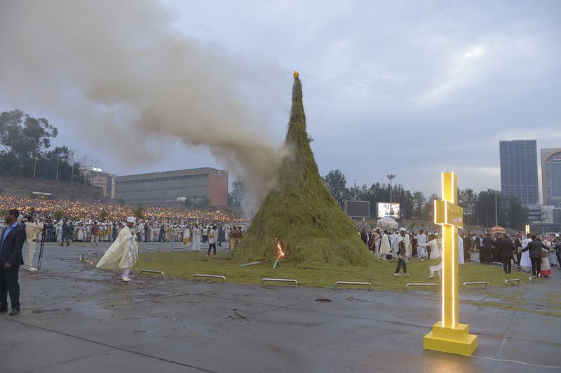 Religious leaders sing to celebrate Meskel, meaning the Cross in Amharic, is an annual religious holiday among Orthodox in Addis Ababa, Ethiopia Thursday, Sept. 26, 2024. (AP Photo)