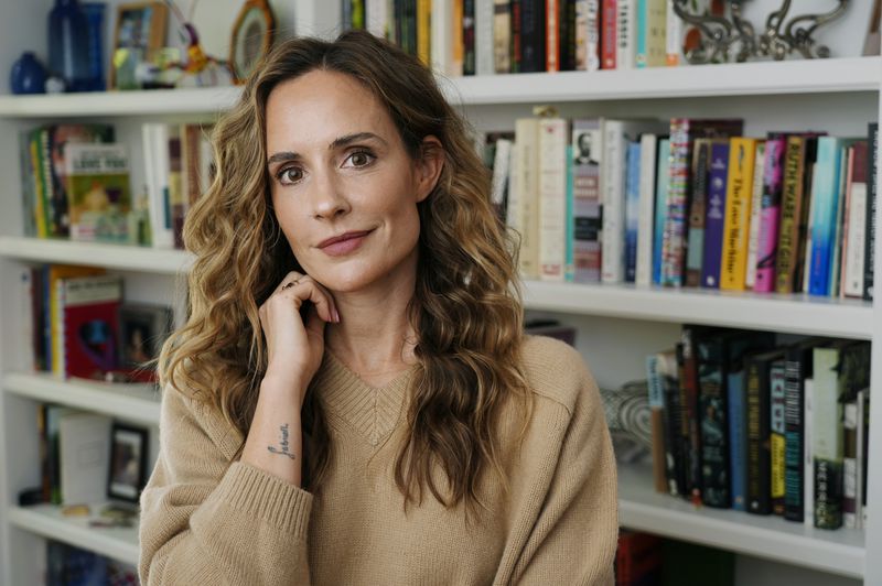 Meaghan Oppenheimer, the creator and showrunner of the Hulu series "Tell Me Lies," poses for a portrait at home, Wednesday, Sept. 11, 2024, in Los Angeles. (AP Photo/Chris Pizzello)