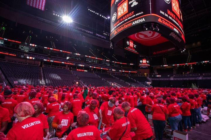 The Atlanta Hawks hosted the Million Meal Pack at State Farm Arena on Saturday, Sept 21, 2024.  Volunteers of all ages filled up 5 shifts of more than 1000 people, where they donated their time in 1 1/2-hour blocks to create the food kits. Several Hawks players took part in the event.  (Jenni Girtman for The Atlanta Journal-Constitution)