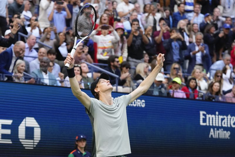 Jannik Sinner, of Italy, reacts after defeating Taylor Fritz, of the United States, to win the men's singles final of the U.S. Open tennis championships, Sunday, Sept. 8, 2024, in New York. (AP Photo/Kirsty Wigglesworth)