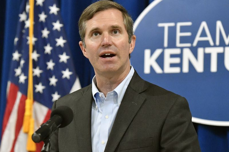 Kentucky Gov. Andy Beshear speaks to a group gathered to celebrate the governor signing an executive order banning the use of “conversion therapy” on minors, Wednesday, Sept. 18, 2024, in Frankfort, Ky. (AP Photo/Timothy D. Easley)