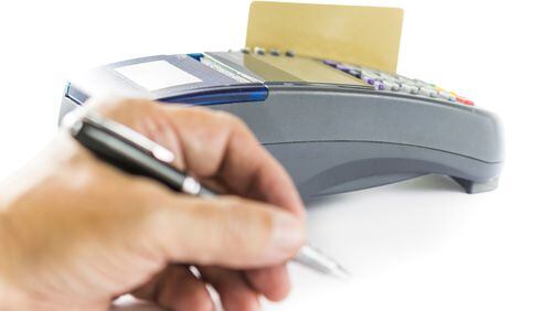 Are you still signing for credit card purchases? In most cases, you don’t have to be. (Dreamstime/TNS)