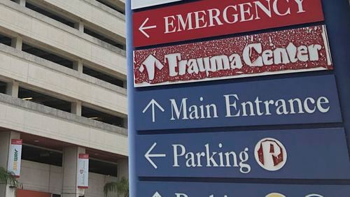 FILE - A sign is displayed outside a hospital in Miami, on July 9, 2020. (AP Photo/Wilfredo Lee, File)