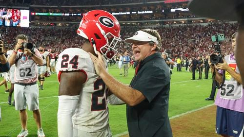 Georgia head coach Kirby Smart greets Georgia defensive back Malaki Starks (24) after their loss to Alabama at Bryant-Denny Stadium, Saturday, Sept. 28, 2024, in Tuscaloosa, Al. Alabama won 41-34. (Jason Getz / AJC)

