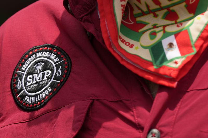 A patch is worn by a member of the Sociedad Mexicano de Parrillieros team at the World Championship Barbecue Cooking Contest, Friday, May 17, 2024, in Memphis, Tenn. (AP Photo/George Walker IV)