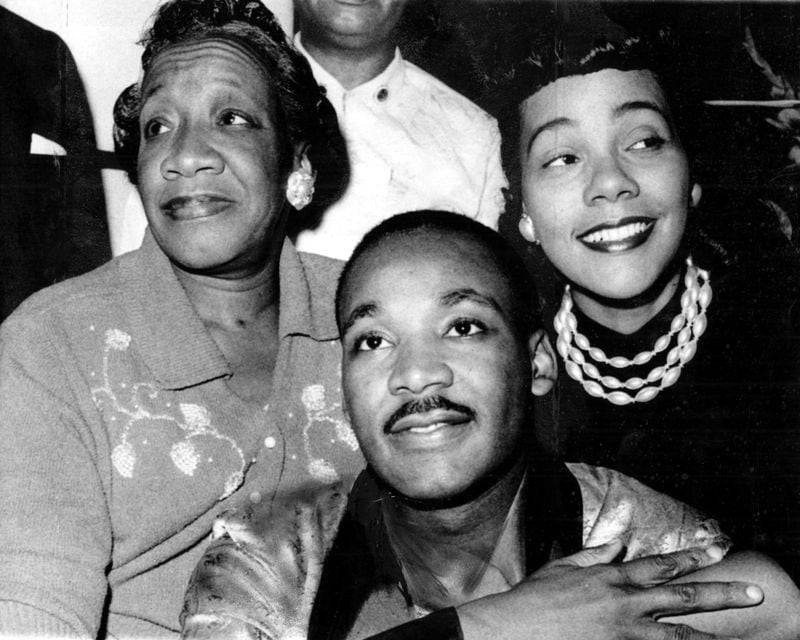 The Rev. Dr. Martin Luther King Jr., flanked by his mother Alberta and his wife Coretta Scott King, recovers at Harlem Hospital in 1958 after surviving a stabbing attack in his chest during a book tour. King forgave the woman who stabbed him. (AJC file)