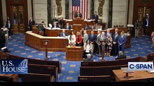 A screenshot shows members of Georgia's congressional delegation gathering Wednesday on the U.S. House floor to honor the victims of the mass shooting at Apalachee High School in Winder. (Courtesy of C-SPAN)