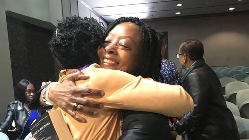 Valerie Boyd (right) embraces author Tina McElroy Ansa at the Clark Atlanta University Annual Black Writers Conference in 2019 where they were both presenters. Courtesy of Georgene Bess Montgomery