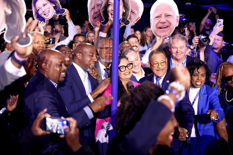 Georgia delegates, including Savannah Mayor Van Johnson (first from left), U.S. Sen. Raphael Warnock, U.S. Rep. Nikema Williams and U.S. Rep Sanford D. Bishop, officially nominate Kamala Harris as the Democratic presidential candidate during the roll call of the states at the Democratic National Convention in Chicago in August. (Arvin Temkar/AJC)