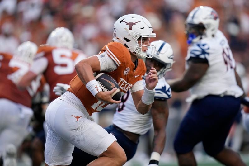 Texas quarterback Arch Manning (16) runs for a 67-yard touchdown against UTSA during the first half of an NCAA college football game in Austin, Texas, Saturday, Sept. 14, 2024. (AP Photo/Eric Gay)