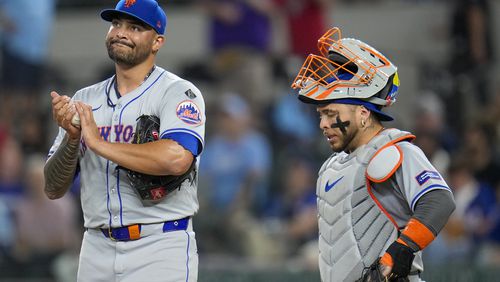 New York Mets pitcher Sean Manaea, left, and catcher Francisco Alvarez react after allowing an RBI double to Texas Rangers' Josh Smith that scored Robbie Grossman during the sixth inning of a baseball game, Wednesday, June 19, 2024, in Arlington, Texas. (AP Photo/Julio Cortez)