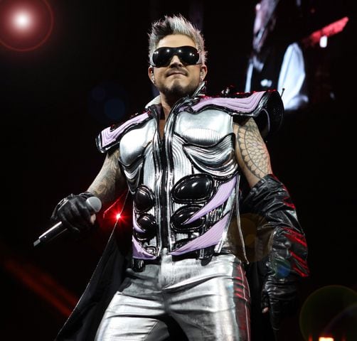 Adam Lambert sings "Radio Ga Ga" as Queen rocked sold out State Farm Arena on Monday, October 23, 2023.
Robb Cohen for the Atlanta Journal-Constitution