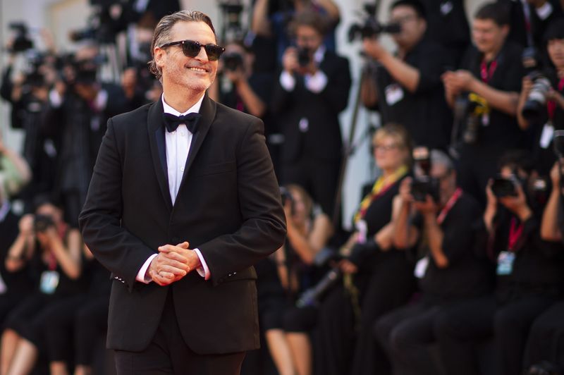 FILE - Actor Joaquin Phoenix appears at the premiere of the film "Joker" at the 76th edition of the Venice Film Festival, Venice, Italy on Aug. 31, 2019. (Photo by Arthur Mola/Invision/AP, File)