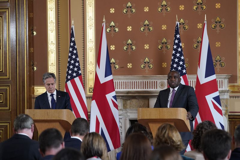 U.S. Secretary of State Antony Blinken, left, listens to Britain's Foreign Secretary David Lammy during a joint press conference in the Locarno room at the Foreign, Commonwealth and Development Office (FCDO) in London, Tuesday, Sept. 10, 2024. (AP Photo/Alberto Pezzali, Pool)