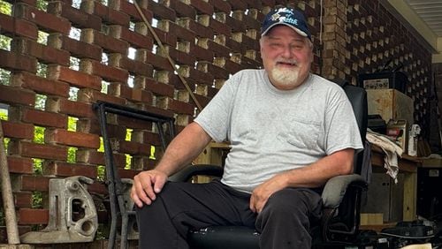 Ron Gordon, a Trump supporter, in his carport in Byron, a pocket of Peach County where Republican presidential contenders regularly fare well. (Joe Kovac Jr. / AJC)