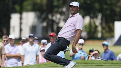 Scottie Scheffler reacts after missing his birdie putt on the fifth hole during the second round of the Tour Championship at East Lake Golf Club, on Friday, Aug. 30, 2024, in Atlanta. (Jason Getz / AJC)
