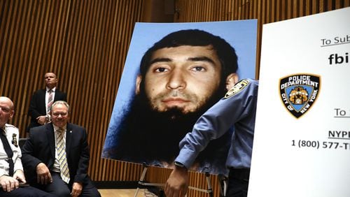 A picture of suspect Sayfullo Saipov is displayed during a press conference about Tuesday's terror attack along a bike path in lower Manhattan. Spencer Platt/Getty Images