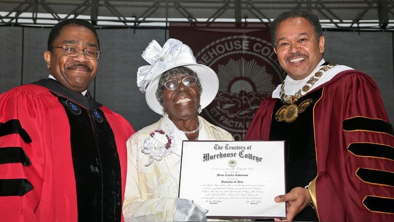 Mary Robinson Spivey shows off her replacement diploma from Morehouse College with Provost Weldon Jackson and President Robert Franklin at the May 2011 ceremony. Spivey was one of 33 women who enrolled in Morehouse between 1929 and 1933. CONTRIBUTED BY MOREHOUSE COLLEGE
