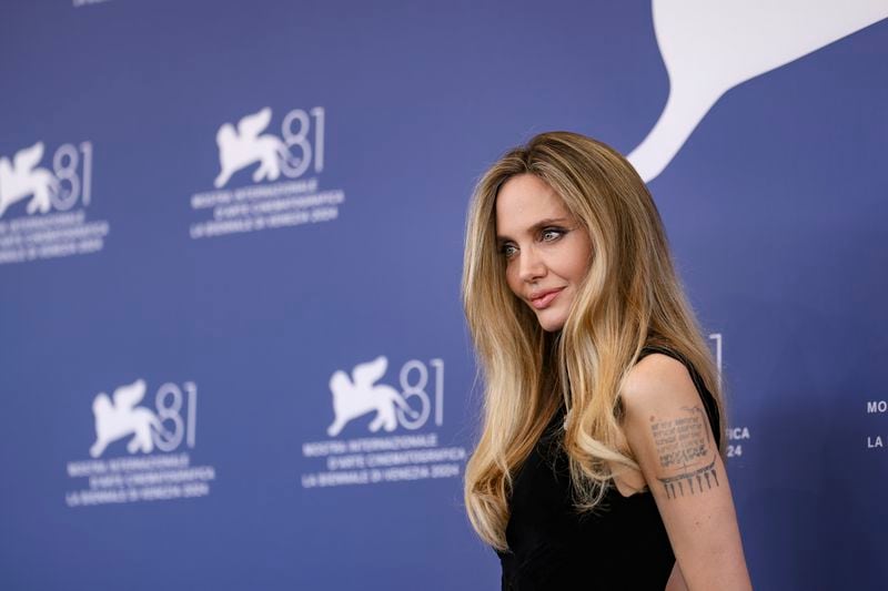 Angelina Jolie poses for photographers at the photo call for the film 'Maria' during the 81st edition of the Venice Film Festival in Venice, Italy, on Thursday, Aug. 29, 2024. (Photo by Vianney Le Caer/Invision/AP)