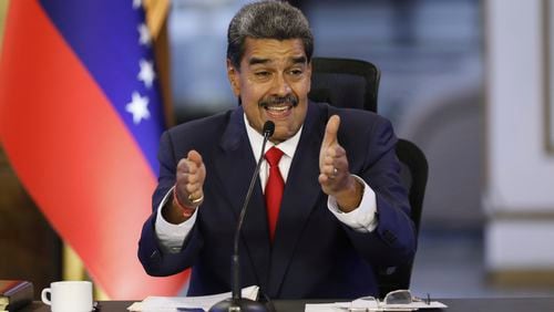 Venezuelan President Nicolas Maduro speaks during a press conference at the Miraflores presidential palace, in Caracas, Venezuela, Friday, Aug. 2, 2024. (AP Photo/Cristian Hernandez)