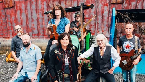The current line-up of the Amy Ray Band. 
Left to right: Dan Walker-keys, Matt Smith-pedal steel, dobro, banjo, Adrian Carter-Fiddle, guitar, Amy Ray, Jeff Fielder-Guitar, mandolin, dobro, Jim Brock-drums, Kerry Brooks-bass.
(Courtesy of Propeller PR)