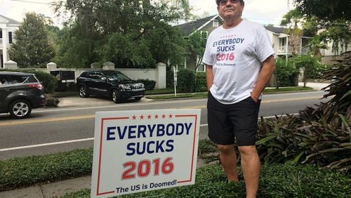 Donn (spelling is correct) Carr, a resident of College Park, has posted a sign that's emblematic of the dissatisfaction many voters have with the two prospective major party presidential candidates. (Steven Lemongello/Orlando Sentinel/TNS)