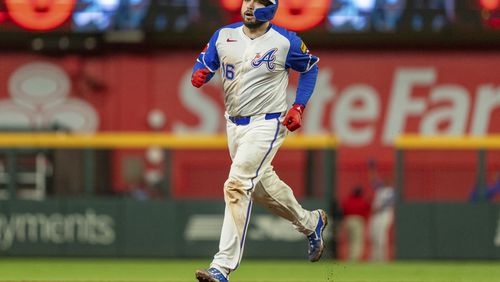 Atlanta Braves' Travis d'Arnaud rounds second base after hitting a walkoff home run to win a baseball game against the Kansas City Royals, Saturday, Sept. 28, 2024, in Atlanta. The Braves won 2-1. (AP Photo/Jason Allen)