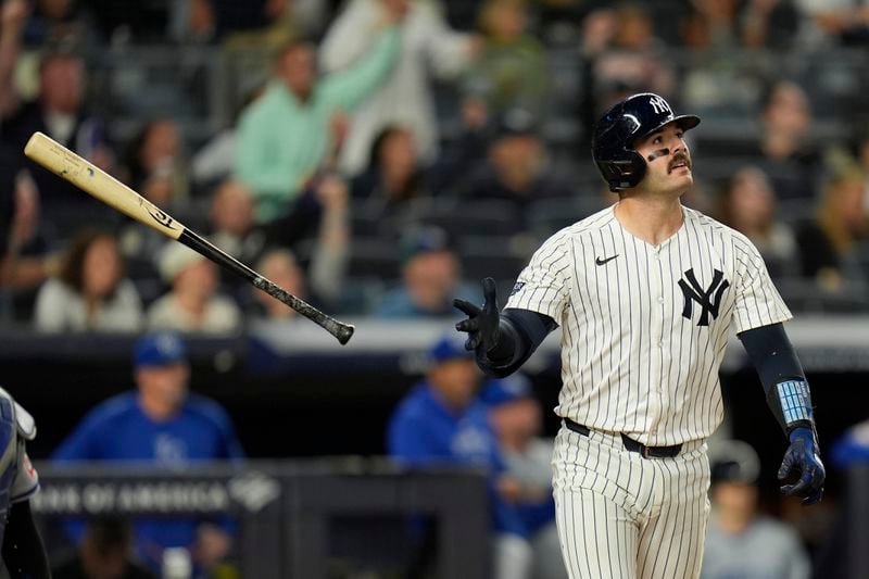 New York Yankees' Austin Wells watches his three-run home run during the seventh inning of a baseball game against the Kansas City Royals at Yankee Stadium, Monday, Sept. 9, 2024, in New York. (AP Photo/Seth Wenig)