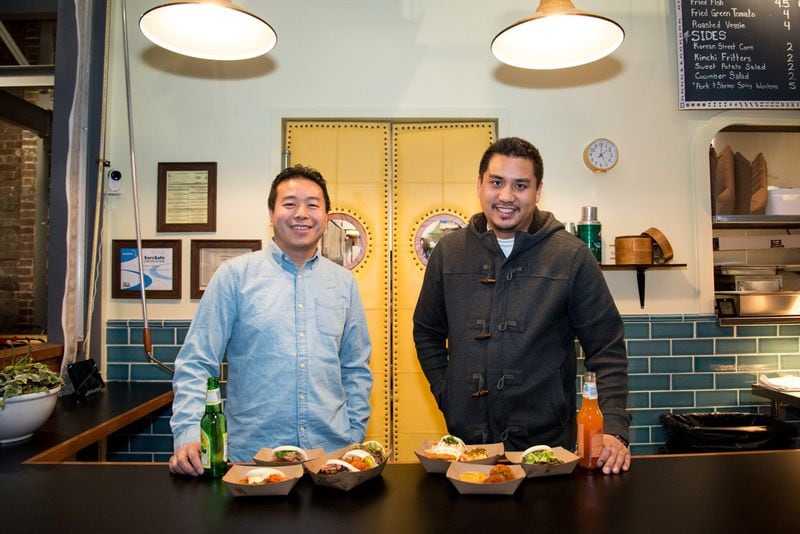 artners Michael Lo and George Yu behind the counter at Suzy Siu's Baos at Krog Street Market. Photo credit- Mia Yakel.