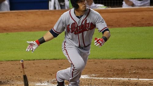 The Braves’ Jace Peterson hits a grand slam in the second inning during a game against the Miami Marlins at Marlins Park on May 16, 2015 in Miami. (Photo by Mike Ehrmann/Getty Images)