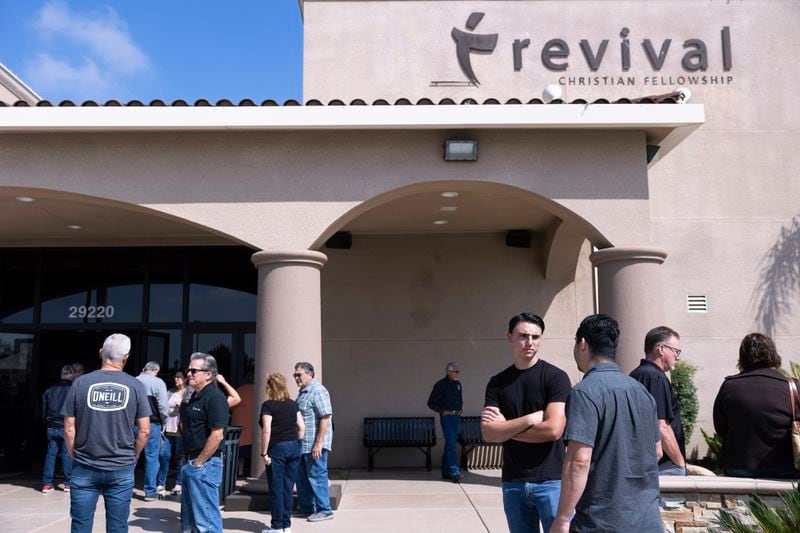 Attendees of a Comeback California Tour event gather outside of Revival Fellowship, Saturday, Sept. 21, 2024, in Menifee, Calif. (AP Photo/Zoë Meyers)