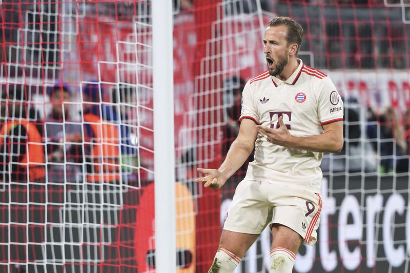 Munich's Harry Kane celebrates after scoring his side's sixth goal during a Champions League opening phase soccer match between FC Bayern Munich and Dinamo Zagreb in Munich, Tuesday, Sept. 17, 2024. (Peter Kneffel/dpa via AP)